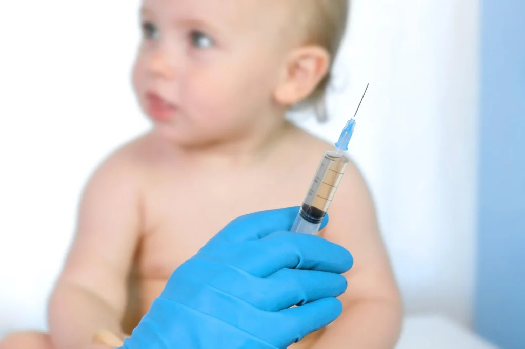 pediatrician vaccinating newborn baby vaccine infant child