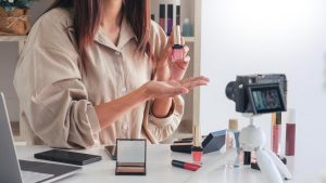 woman promoting makeup products